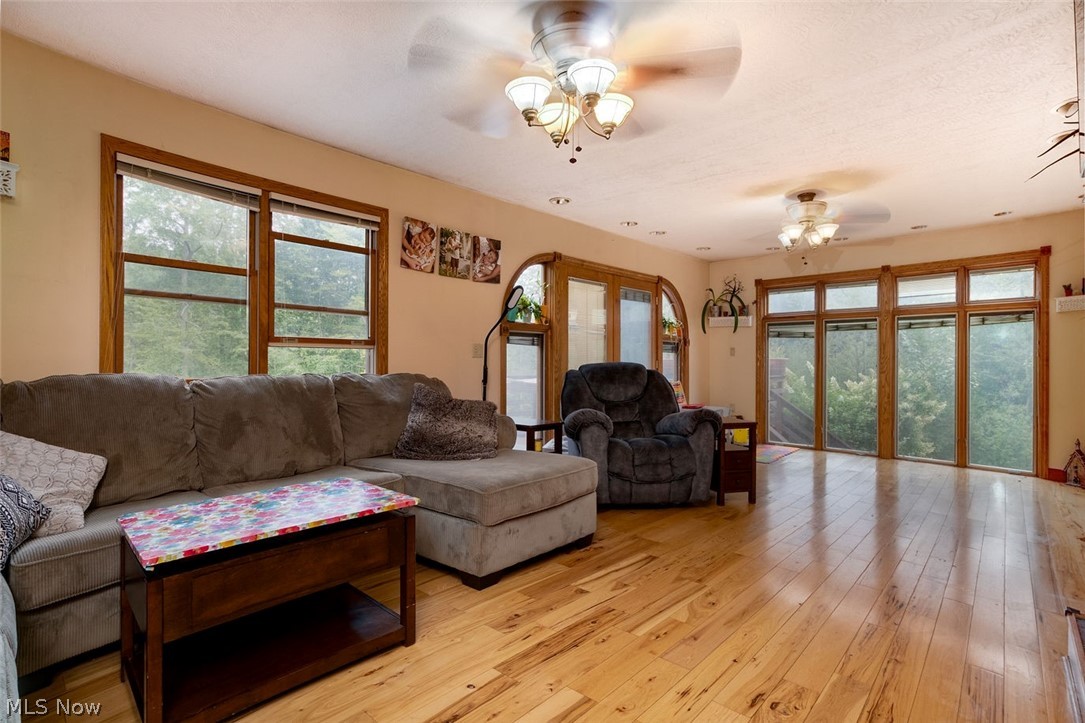 16105 Madison Road Middlefield, OH 44062 - Photo 3 of 35 Living room with gorgeous hardwood floors