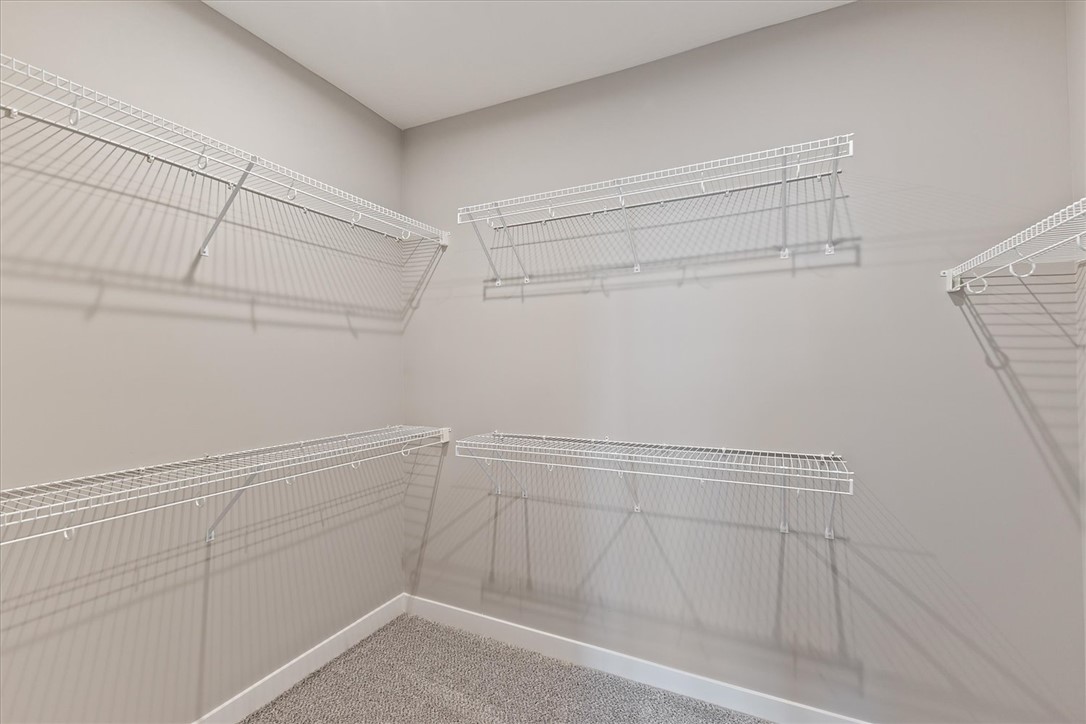 407 South Landon Lane Springfield, OH 45502 - Photo 14 of 30 This organized closet space features wire shelving systems for ample storage and plush carpeting underfoot.