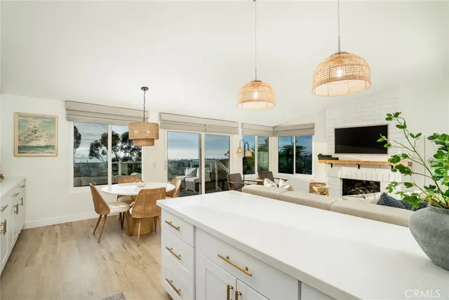 a kitchen with a stove a sink and a refrigerator
