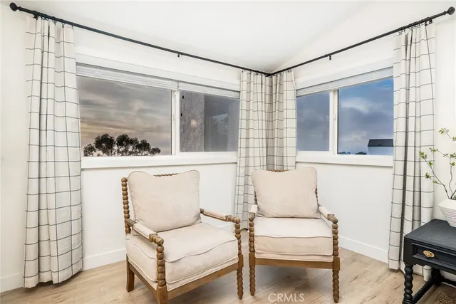 a living room with a couch and a fireplace