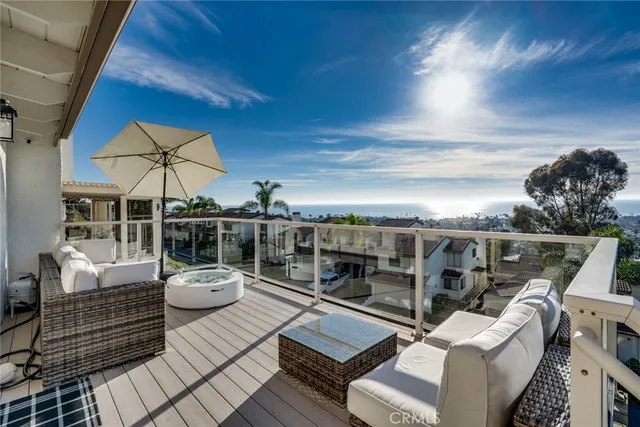 a view of a roof deck with couches