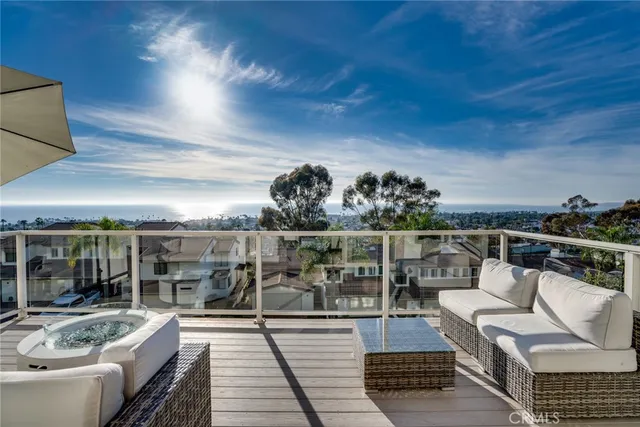a view of a balcony with furniture