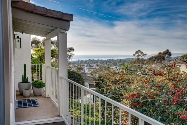 a view of a balcony with an outdoor space
