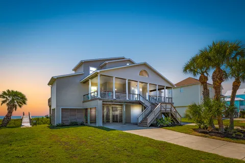 a view of a house with a big yard