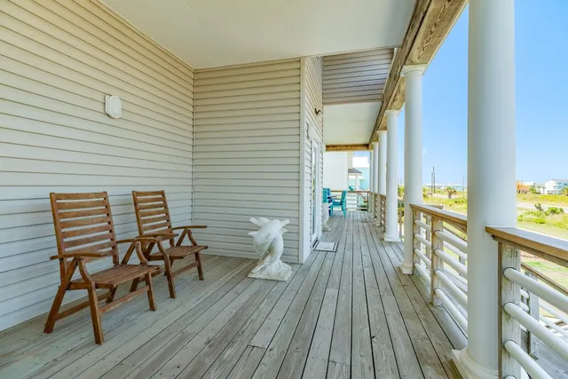 a view of a chairs on the deck