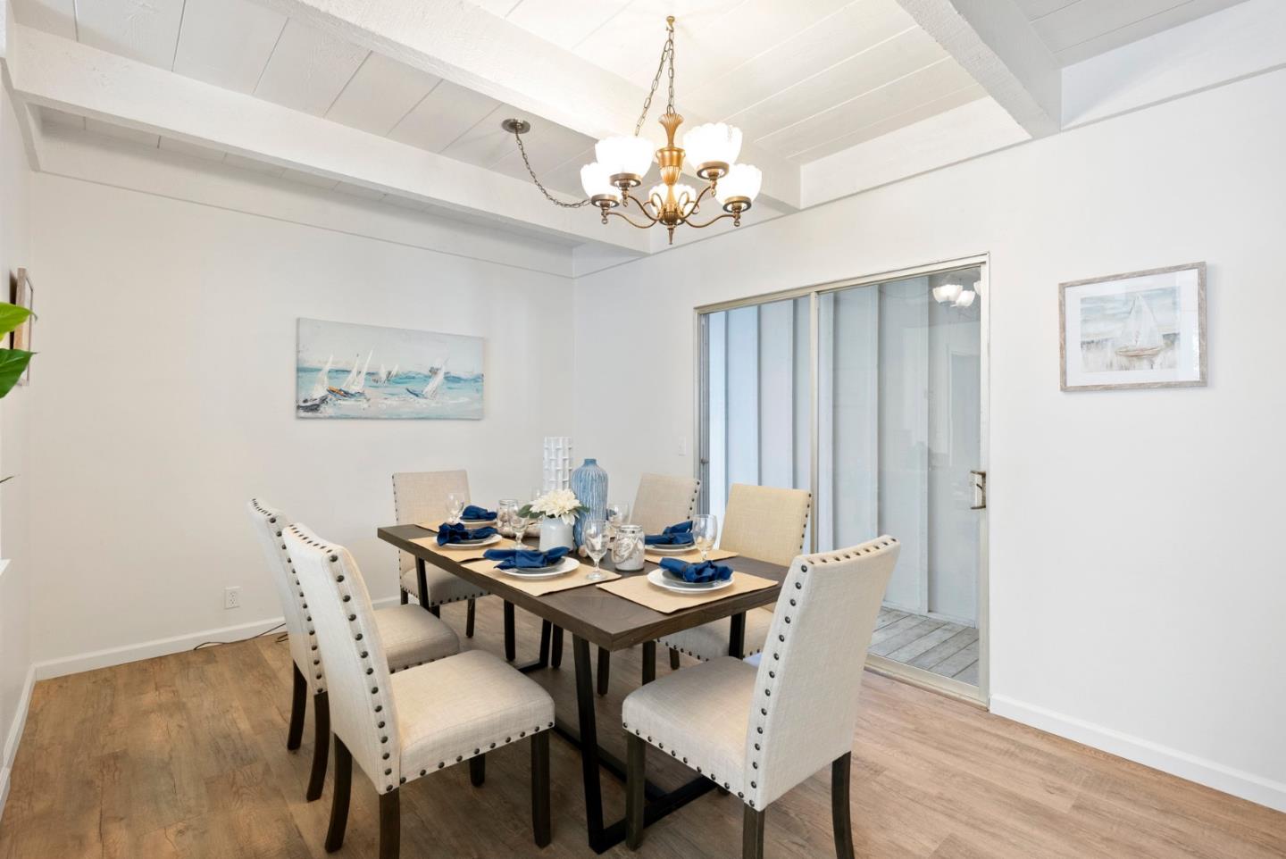 1272 Castro Road Monterey, CA 93940 - Photo 15 of 54 a dining room with furniture and chandelier