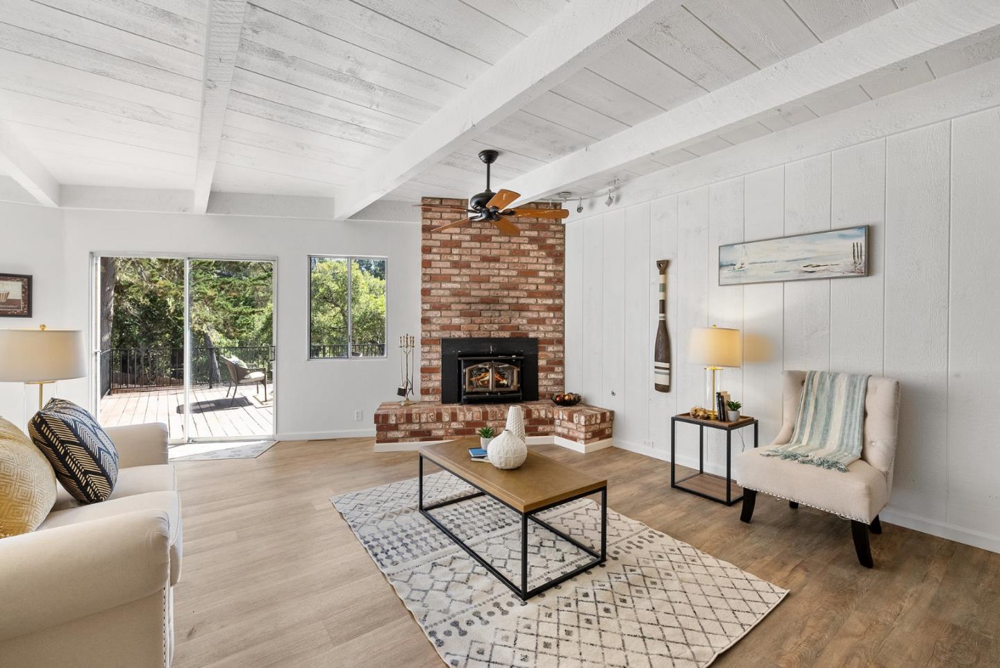 1272 Castro Road Monterey, CA 93940 - Photo 17 of 54 a living room with furniture and a fireplace