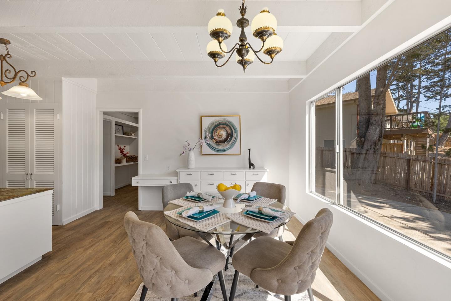 1272 Castro Road Monterey, CA 93940 - Photo 22 of 54 a living room with furniture and a large window