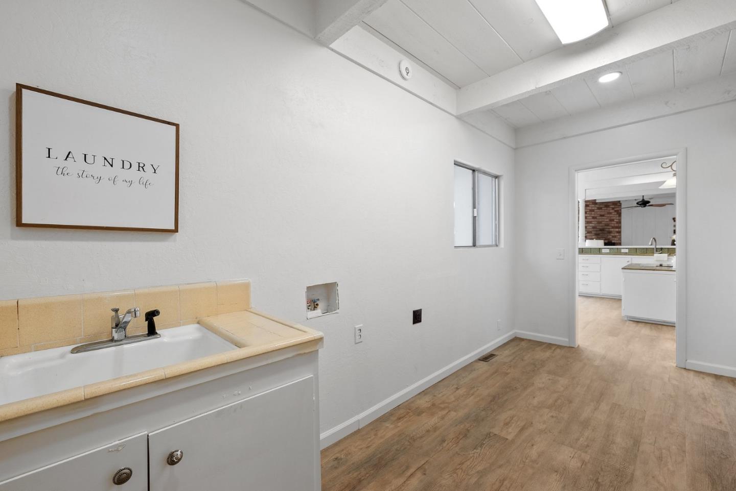 1272 Castro Road Monterey, CA 93940 - Photo 25 of 54 a view of a kitchen with a sink and cabinets