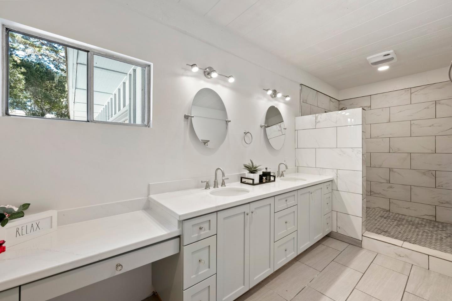 1272 Castro Road Monterey, CA 93940 - Photo 30 of 54 a bathroom with a sink a toilet and a mirror