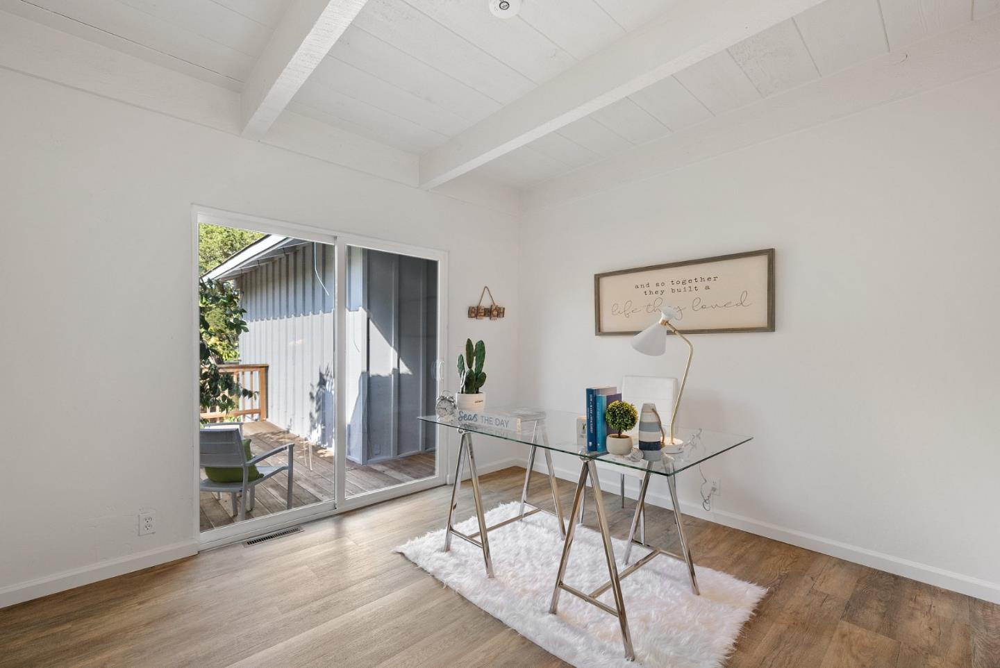 1272 Castro Road Monterey, CA 93940 - Photo 38 of 54 a workspace with wooden floor and windows