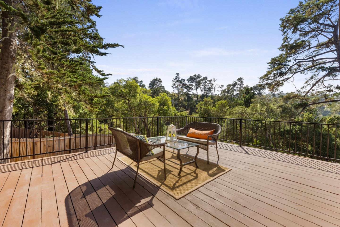 1272 Castro Road Monterey, CA 93940 - Photo 45 of 54 a view of a chairs on deck with wooden floor and fence