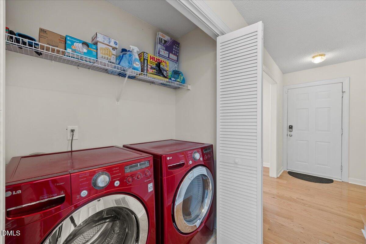 1932 Stroll Circle Fuquay-Varina, NC 27526 - Photo 12 of 24 a utility room with dryer and washer