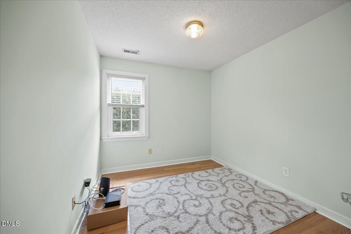 1932 Stroll Circle Fuquay-Varina, NC 27526 - Photo 16 of 24 an empty room with a window