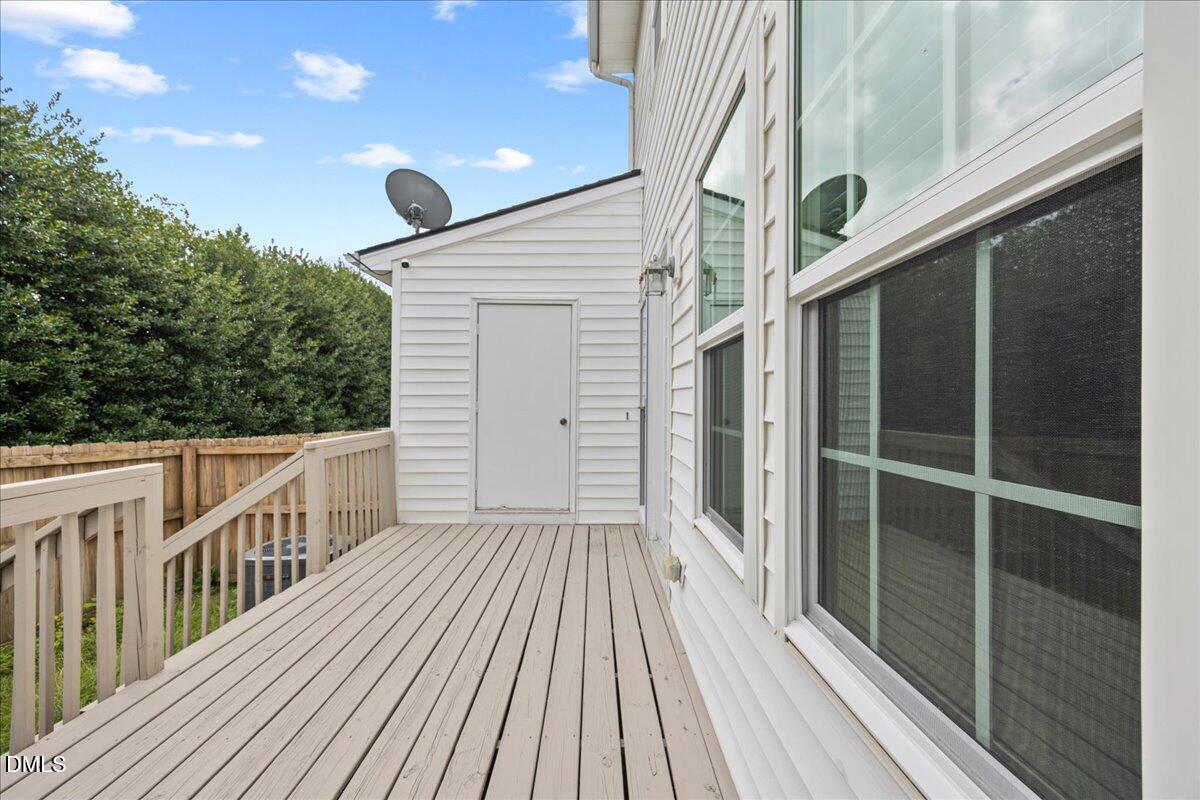 1932 Stroll Circle Fuquay-Varina, NC 27526 - Photo 21 of 24 a view of a balcony with wooden floor