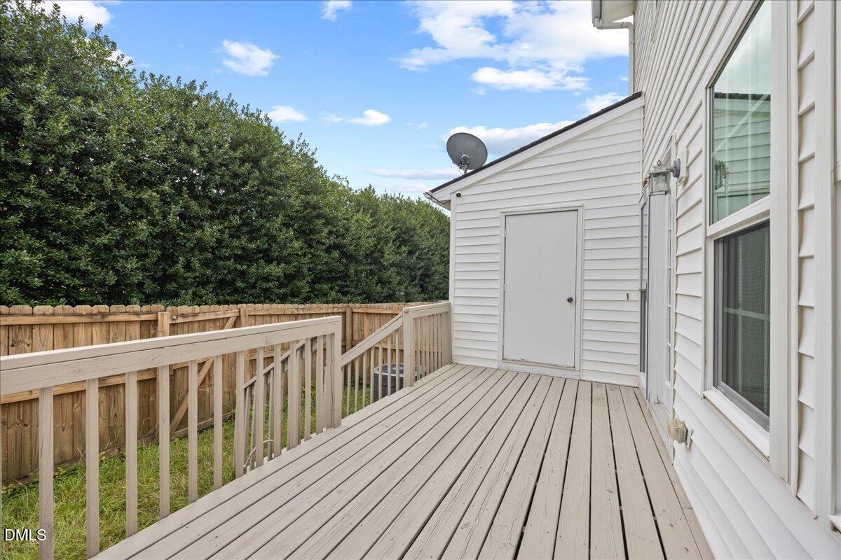 1932 Stroll Circle Fuquay-Varina, NC 27526 - Photo 23 of 24 a view of a balcony with wooden floor