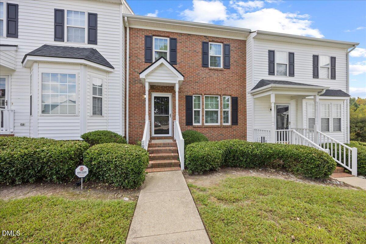 1932 Stroll Circle Fuquay-Varina, NC 27526 - Photo 24 of 24 a front view of a house with a yard