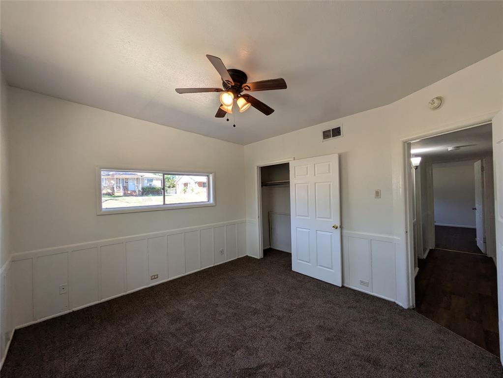 710 Boulevard Boulevard North Dallas, TX 75211 - Photo 14 of 21 a view of empty room with ceiling fan