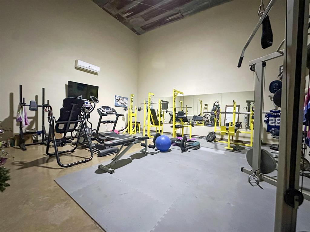 1990 Jim Harry Loop Sunset, TX 76270 - Photo 23 of 39 a view of a room with gym equipment