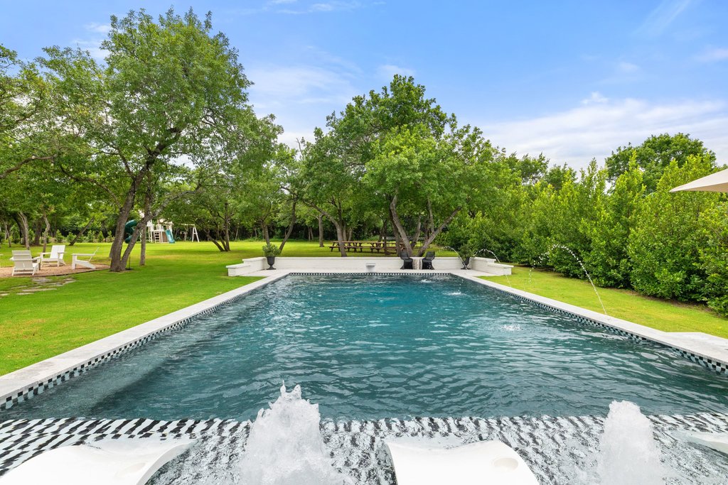 2324 High Lonesome Leander, TX 78641 - Photo 3 of 40 This home redefines luxury living with an outdoor haven that’ll leave you breathless.