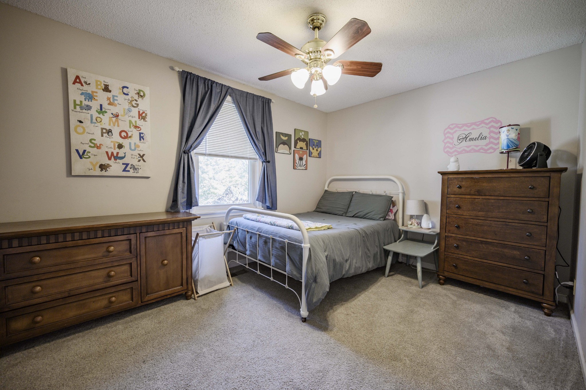 1430 Cedar Bluff Road Lebanon, TN 37087 - Photo 22 of 27 a bedroom with a bed and a cabinet