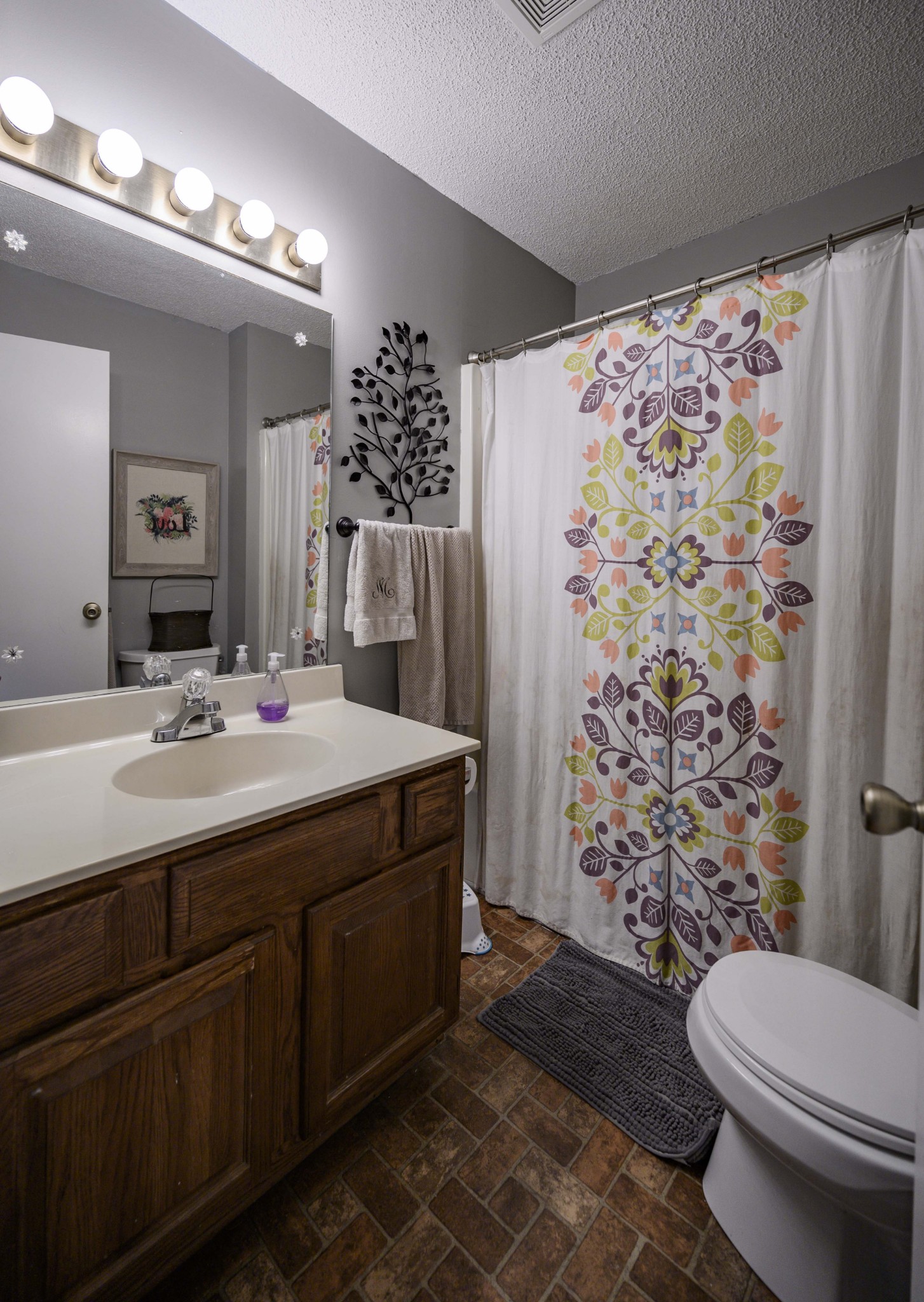 1430 Cedar Bluff Road Lebanon, TN 37087 - Photo 23 of 27 a bathroom with a sink toilet and shower