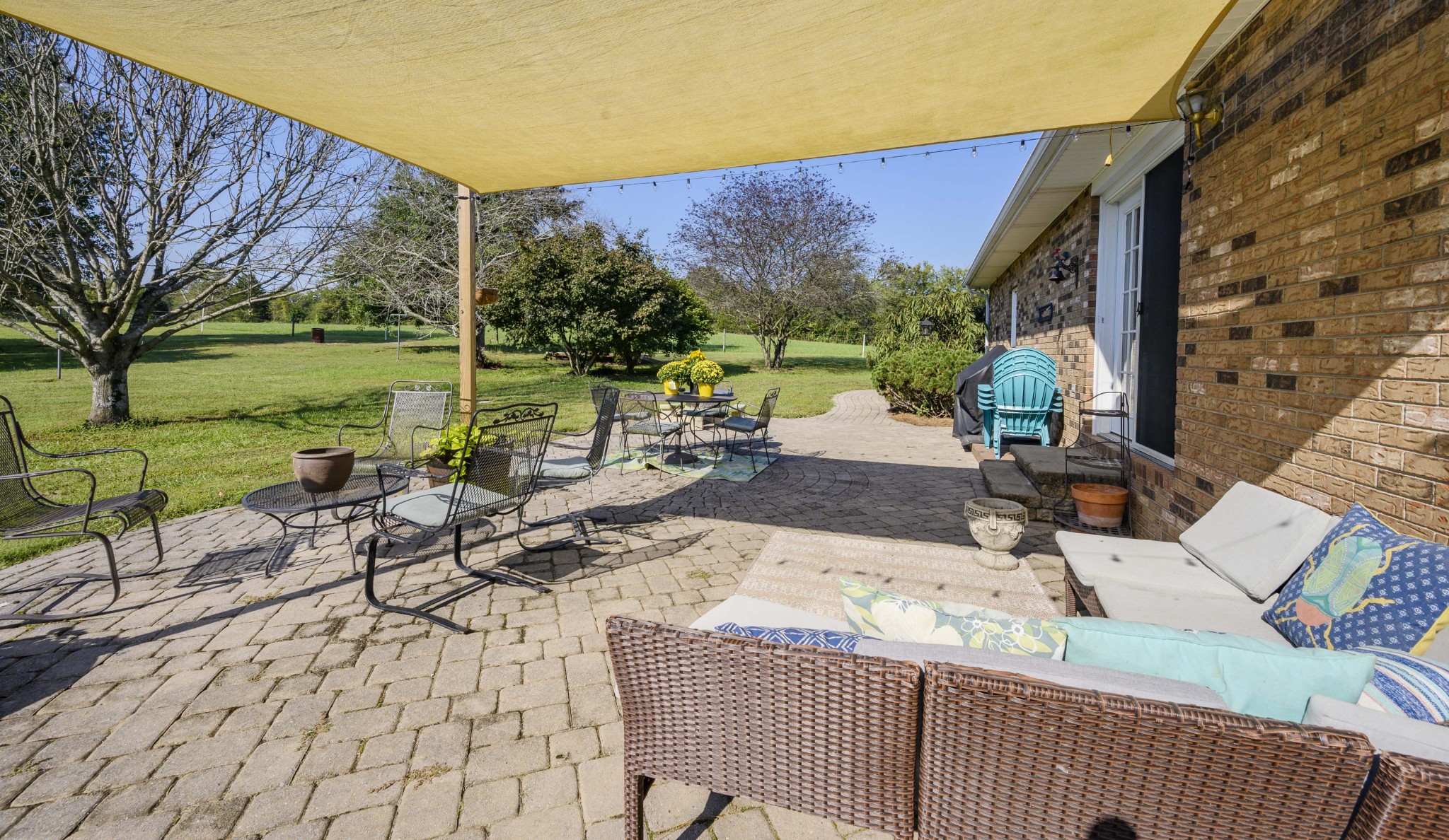 1430 Cedar Bluff Road Lebanon, TN 37087 - Photo 10 of 27 a view of a patio with a table chairs and a floor to ceiling window