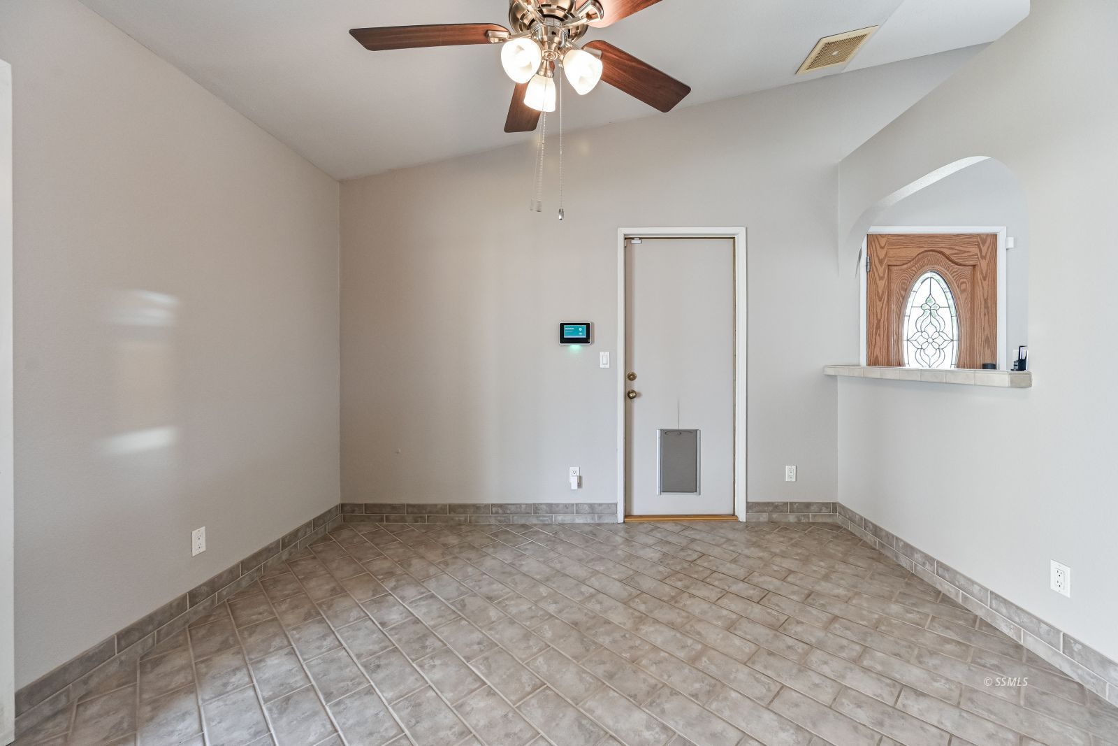 131 Chambers Street Ridgecrest, CA 93555 - Photo 10 of 28 wooden floor in an empty room with a window
