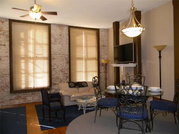 a view of a dining room with furniture