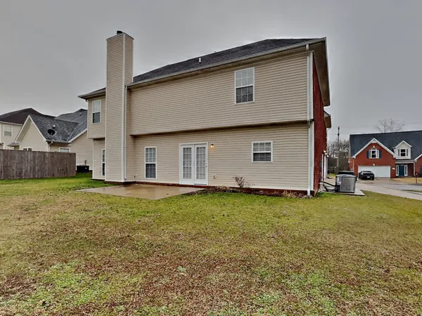 a house view with a garden space
