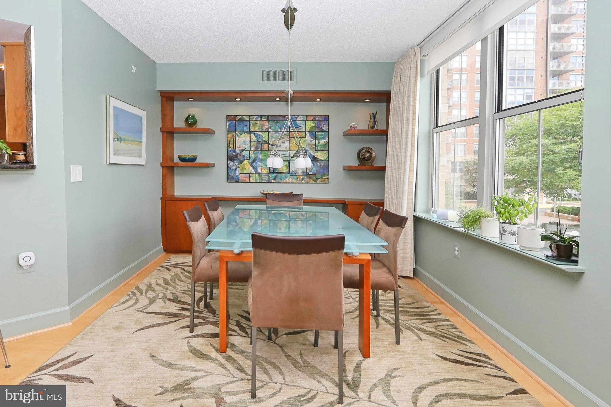 11800 Sunset Hills Road, Unit 222 Reston, VA 20190 - Photo 13 of 62 Custom built-in wall unit in the dining room