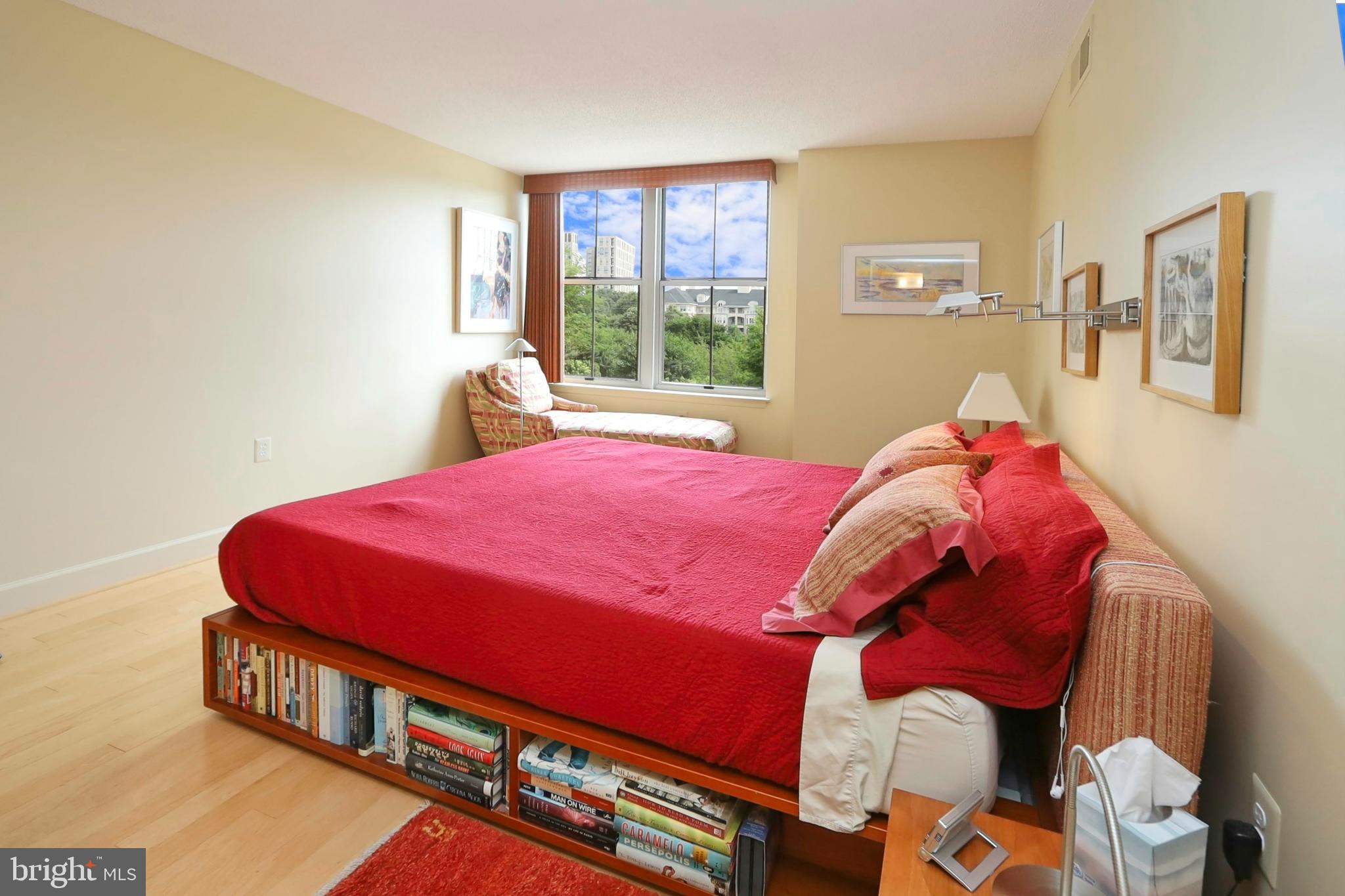 11800 Sunset Hills Road, Unit 222 Reston, VA 20190 - Photo 20 of 62 Primary bedroom with wooded views