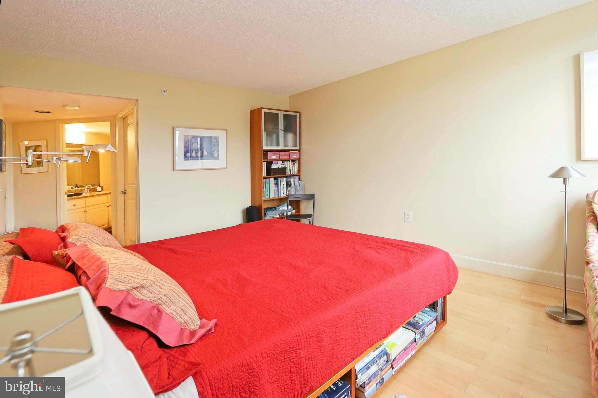 11800 Sunset Hills Road, Unit 222 Reston, VA 20190 - Photo 22 of 62 Custom bookcase built-in conveys