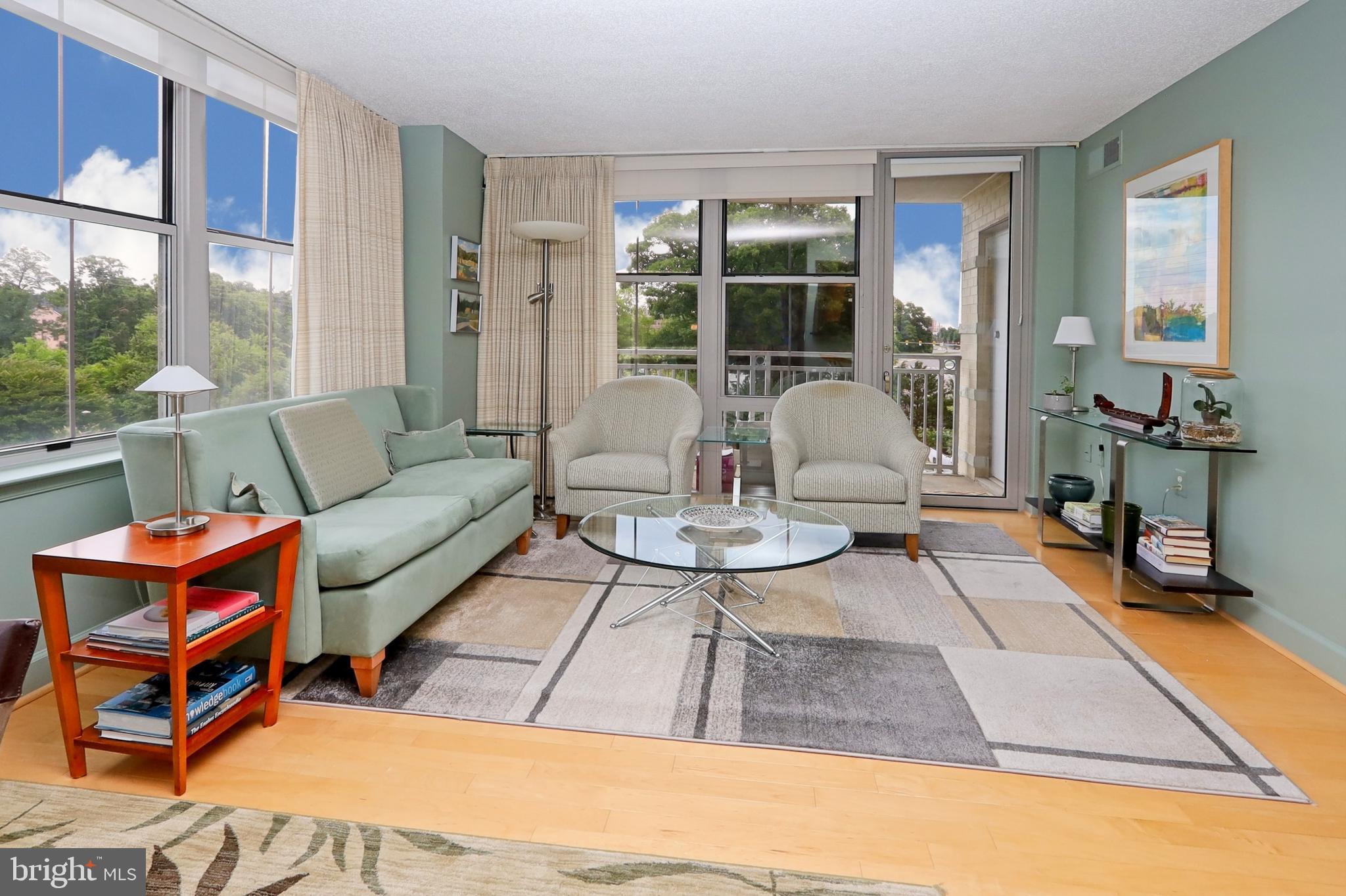 11800 Sunset Hills Road, Unit 222 Reston, VA 20190 - Photo 10 of 62 Living room offers balcony access