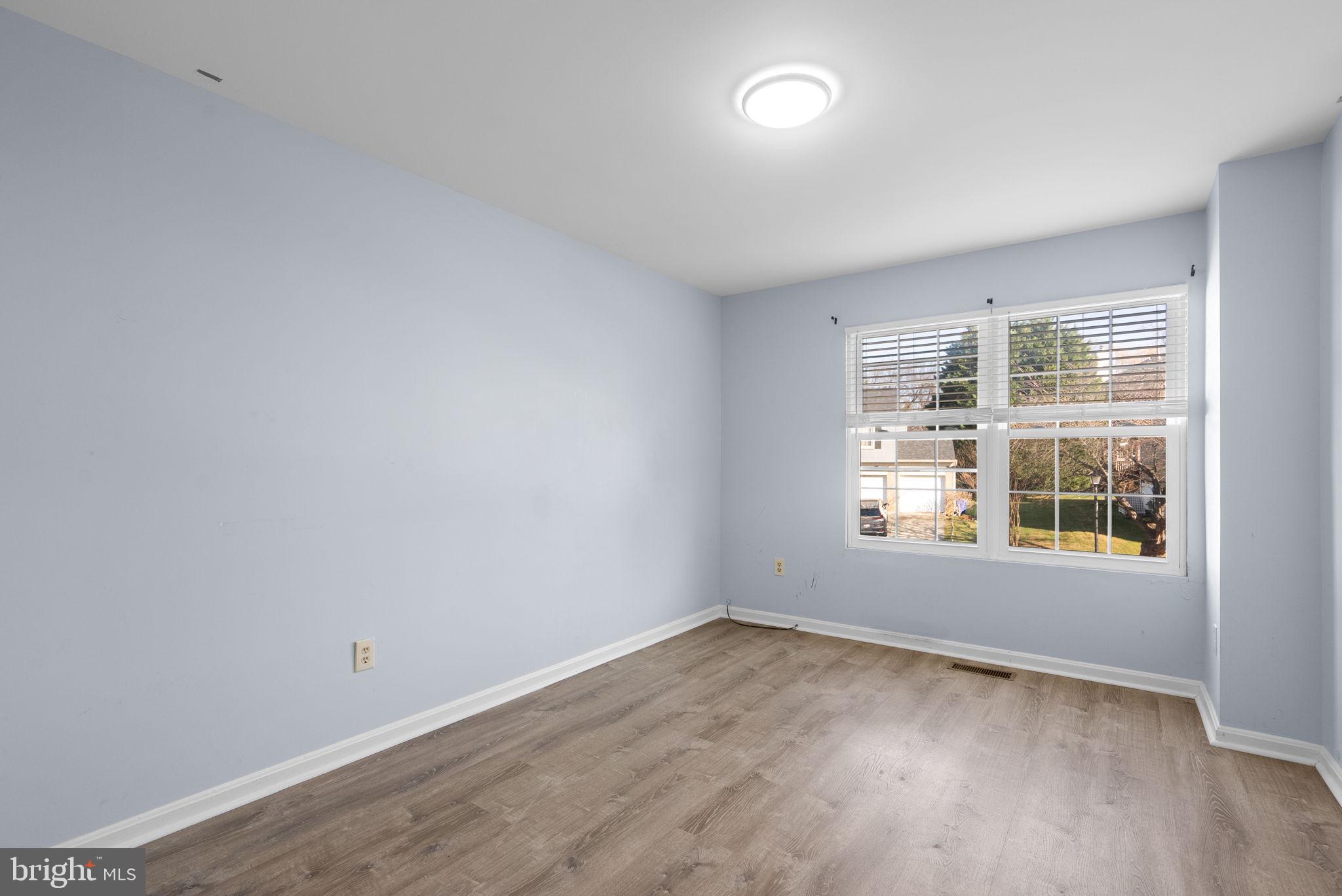 13137 Broadmore Road Silver Spring, MD 20904 - Photo 12 of 28 an empty room with a window