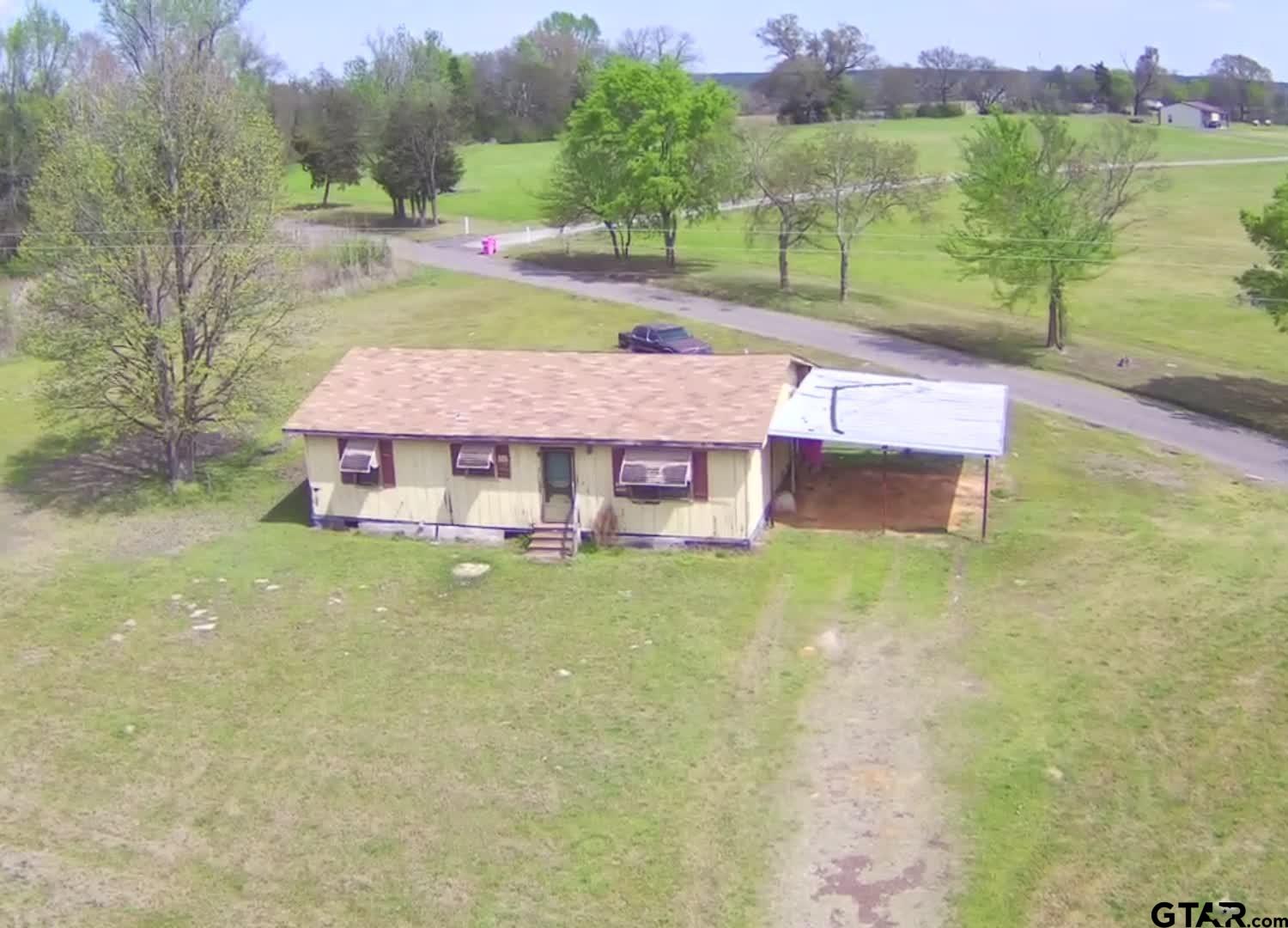2741 Toad Road Gilmer, TX 75644 - Photo 6 of 20 an aerial view of a house with big yard