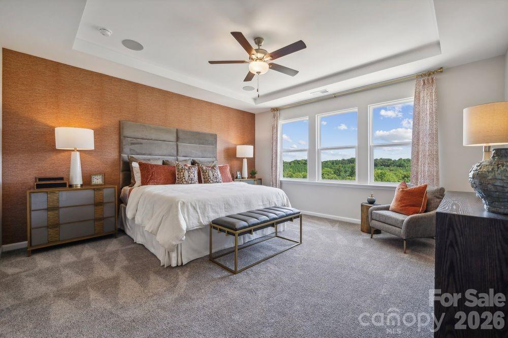 3168 Beacon Hts Road Indian Land, SC 29707 - Photo 14 of 36 a bed room with a bed and a couch