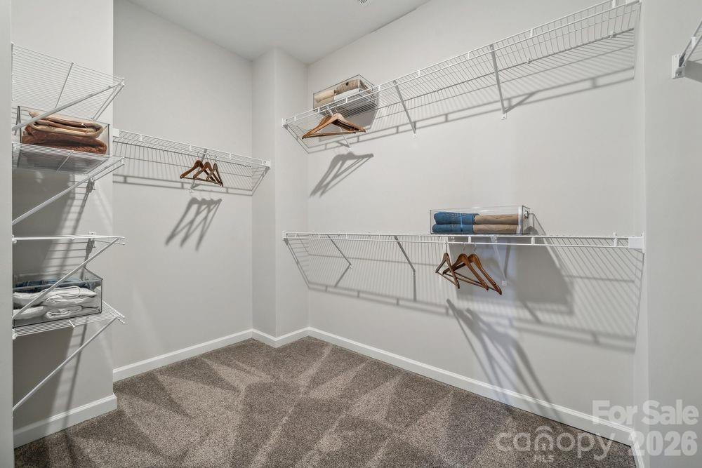 3168 Beacon Hts Road Indian Land, SC 29707 - Photo 18 of 36 a view of a room with racks on the wall