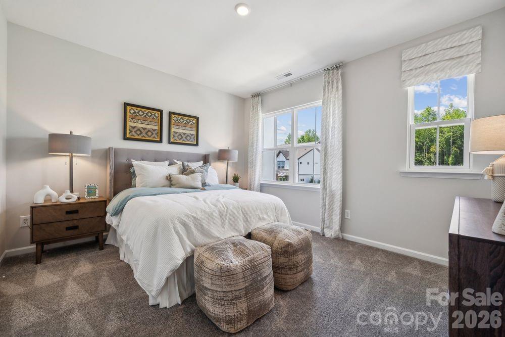 3168 Beacon Hts Road Indian Land, SC 29707 - Photo 21 of 36 a bedroom with a bed and a tv