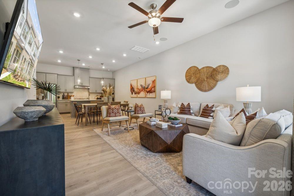 3168 Beacon Hts Road Indian Land, SC 29707 - Photo 6 of 36 a living room with furniture and a large window