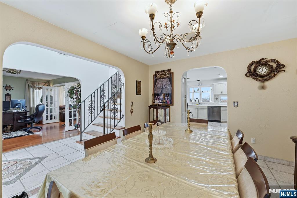 703 Stewart Street Ridgefield, NJ 07657 - Photo 11 of 38 a room with lots of gym equipment