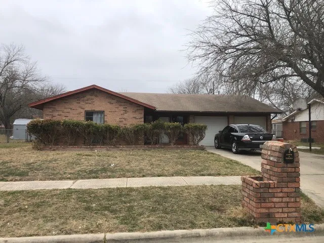 a view of backyard of house