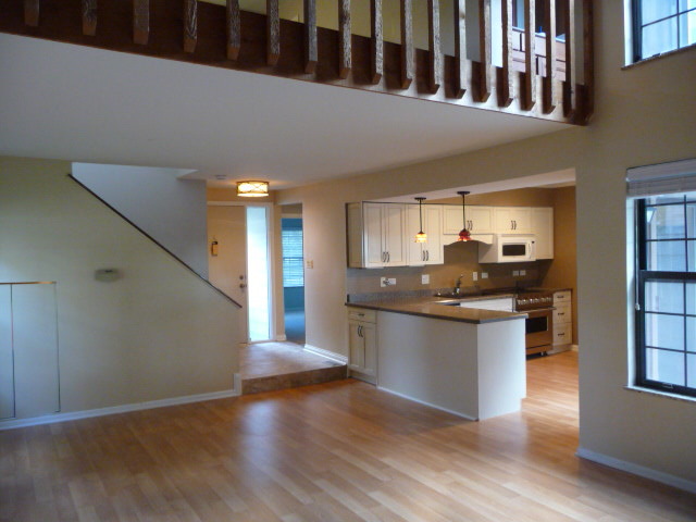 694 Chandler Road Gurnee, IL 60031 - Photo 2 of 16 a kitchen with stainless steel appliances kitchen island granite countertop a refrigerator a sink and a stove