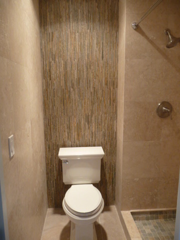 694 Chandler Road Gurnee, IL 60031 - Photo 11 of 16 a white toilet sitting next to a shower curtain