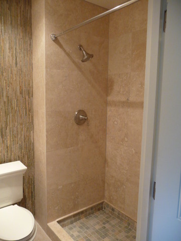 694 Chandler Road Gurnee, IL 60031 - Photo 12 of 16 a bathroom with a toilet and a shower