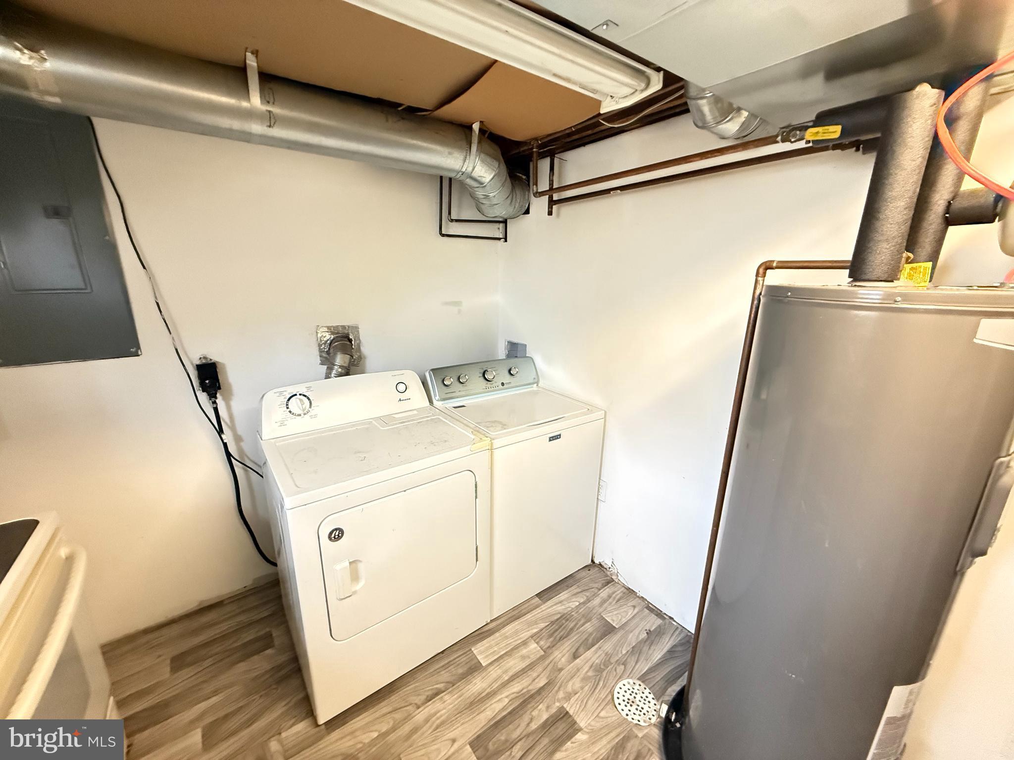 15205 Michigan Rd. Woodbridge, VA 22191 - Photo 15 of 20 a utility room with dryer and washer