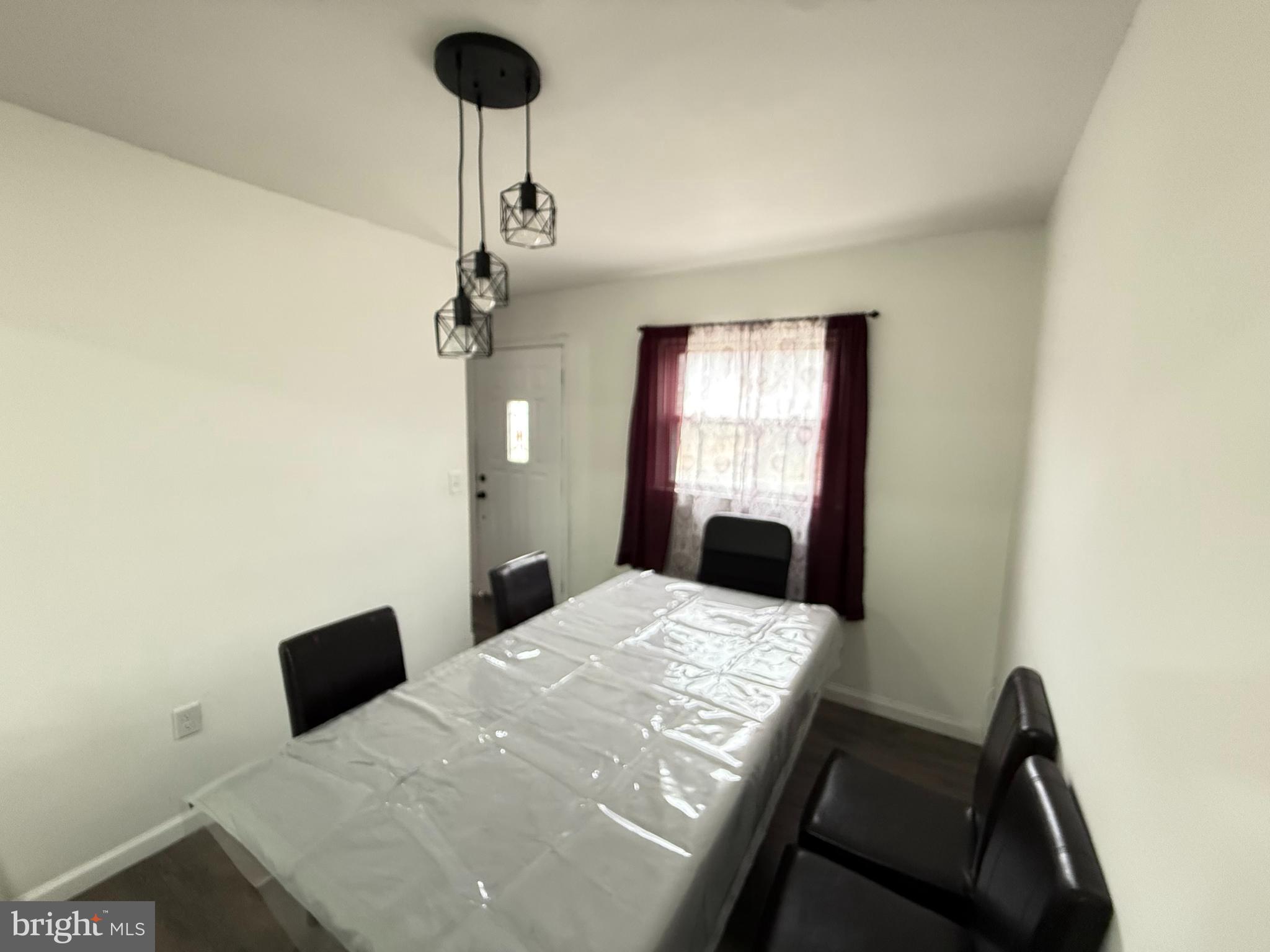 15205 Michigan Rd. Woodbridge, VA 22191 - Photo 4 of 20 a bedroom with a bed and a window