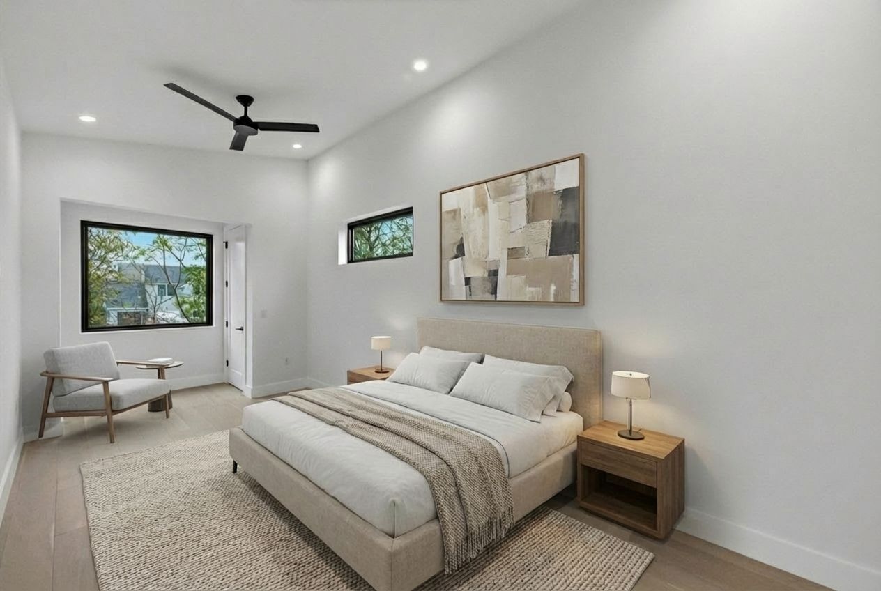 802 Philco Drive, Unit 2 Austin, TX 78745 - Photo 12 of 29 a bedroom with a bed and a large window