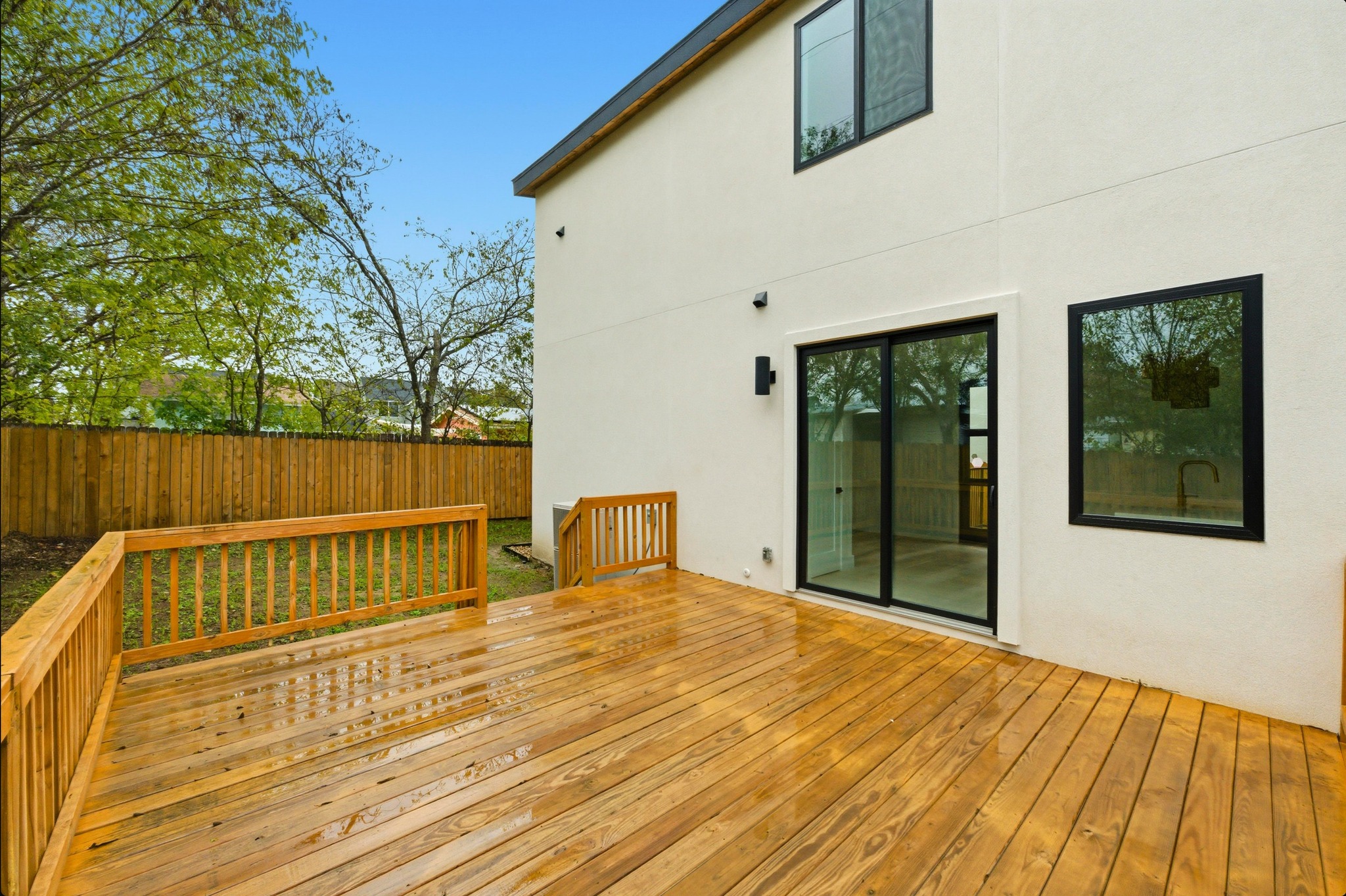 802 Philco Drive, Unit 2 Austin, TX 78745 - Photo 21 of 29 a view of balcony with wooden floor and outdoor space