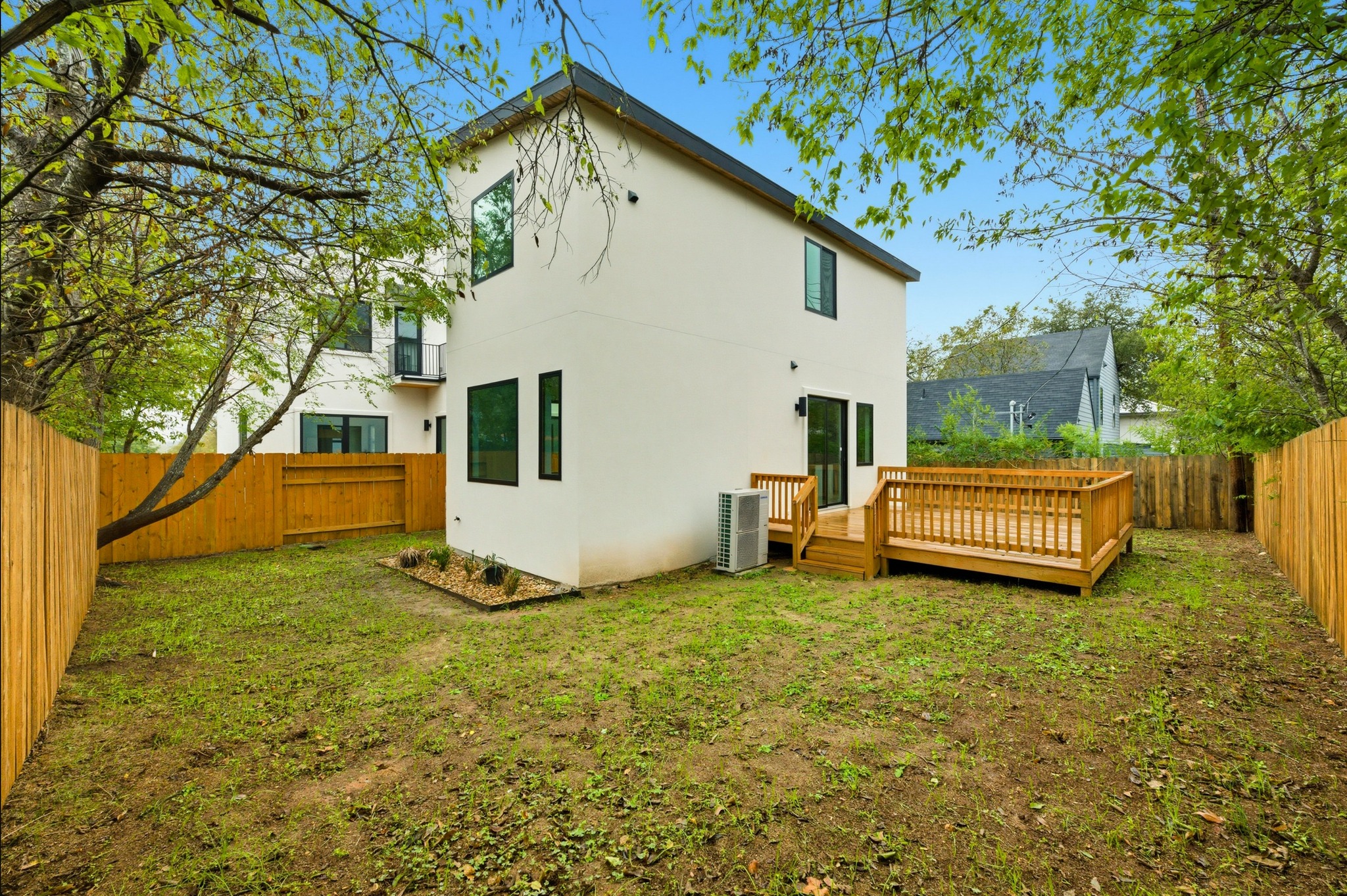 802 Philco Drive, Unit 2 Austin, TX 78745 - Photo 24 of 29 a view of a house with backyard